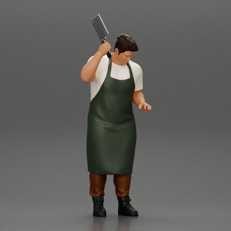 butcher standing while holding a cleaver and cutting something