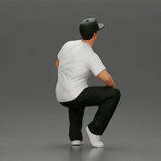 hip-hop man sitting in shirt and cap - Only-Games
