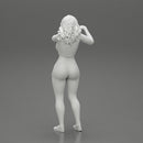 Travel woman in short pointing her next destination using world map - Only-Games