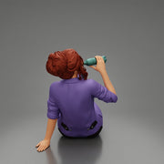 Tired woman mechanic sitting and drinking water during from bottle - Only-Games