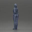 policewoman standing hand resting on her back speaking into a radio with short hair - Only-Games