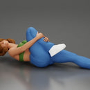 woman in bra lying on the floor touching her injured knee - Only-Games