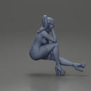 Woman in Pink Dress and heels sitting Deep in Thought - Only-Games