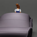 sexy girl in short denim overalls and heels is sitting on the car - Only-Games