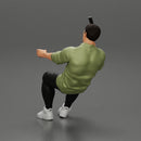 Gangster sitting at the table with a glass of whisky holding gun and playing poker - Only-Games