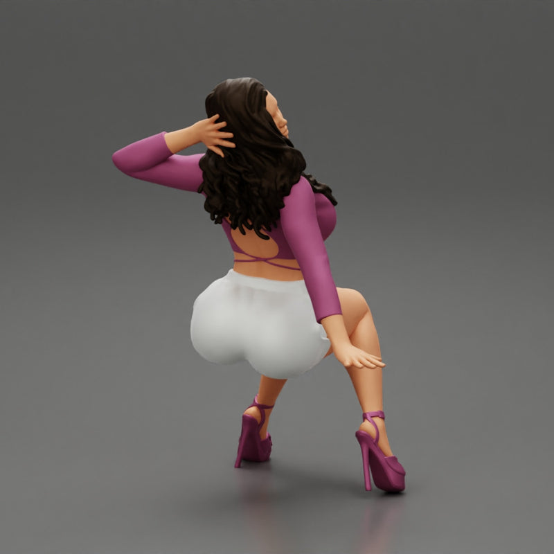 Young sexy girl in shorts with long hair is sitting with one hand in hair - Only-Games