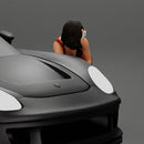 Girl mechanic in overalls turns off the front wheel of  car with a key for removing the wheel - Only-Games