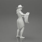 travel woman in hat and dress with sun glasses holding a map and looking to the map - Only-Games