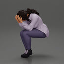 sad girl in a puff-sleeve shirt sitting and crying with her hands covering her face - Only-Games