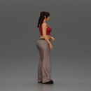Chola girl with pigtails standing in flared pants - Only-Games