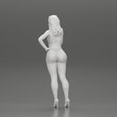 sexy girl in mini overalls posing smoking cigarette on the beach - Only-Games