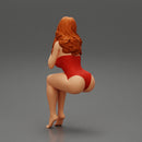 Sexy girl in swimsuit sitting - Only-Games