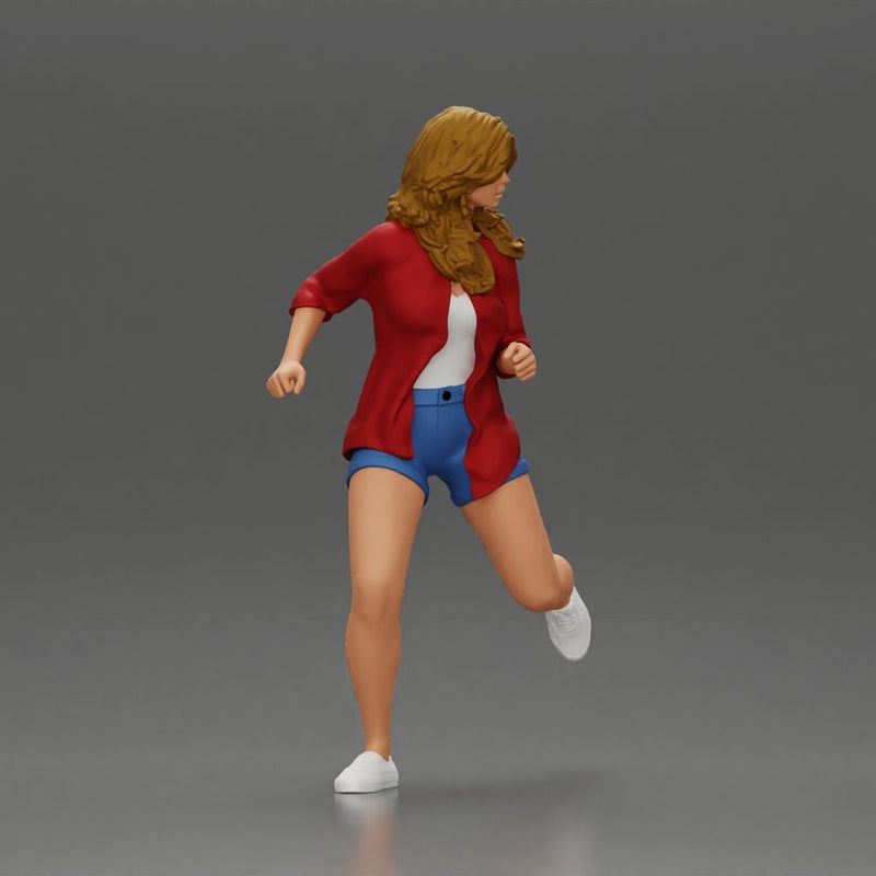 Afraid young woman running in an open shirt and shorts with a determined expression