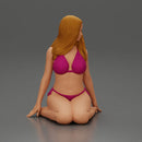 Beautiful Woman in Bikini Sitting on the Beach - Only-Games