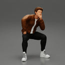 man in leather jacket sitting in thinking pose - Only-Games