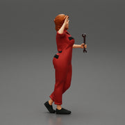 Tired woman mechanic holding a spanner - Only-Games