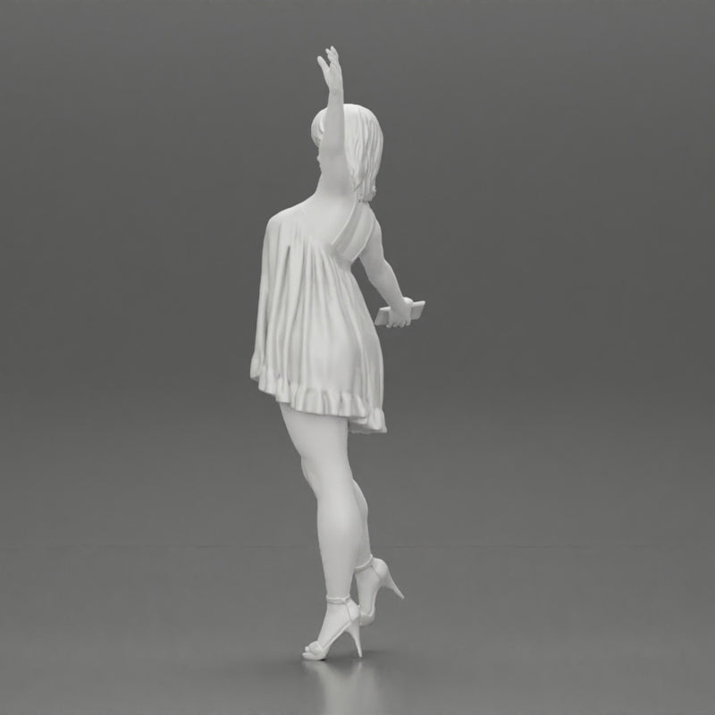 Happy Young Woman in dress and heels Standing on One Leg holding phone - Only-Games