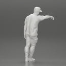 gangster man standing and leaning against the wall in cap - Only-Games