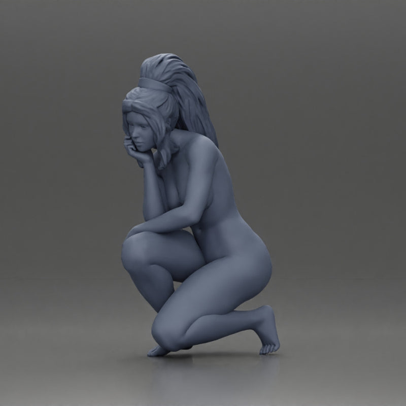 Naked girl sitting and looking