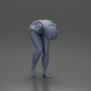 Naked girl holding her stomach and placing her hand on the wall due to stomach pain - Only-Games