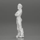 A chola girl with curly hair standing in large pants with crossed hands - Only-Games