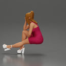 Woman in Pink Dress and heels sitting Deep in Thought - Only-Games