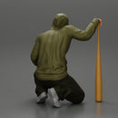 gangster homie in hoodie sitting holding a baseball bat - Only-Games