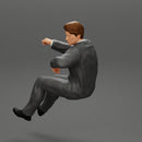 businessman sitting in his car holding steering wheel leaning his left arm on the window - Only-Games