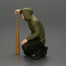 gangster homie in hoodie sitting holding a baseball bat - Only-Games