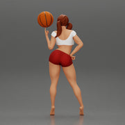 Sexy Young Sporty Girl Playing With the Ball on the Basketball - Only-Games