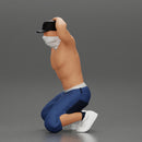 Gangster in mask and cap sitting putting his hands behind head about to be arrested - Only-Games