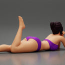 Sexy woman lying in fashionable elegant bikini swimsuit - Only-Games