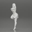 Sexy girl in mini skirt and heels Leaning Against wall - Only-Games