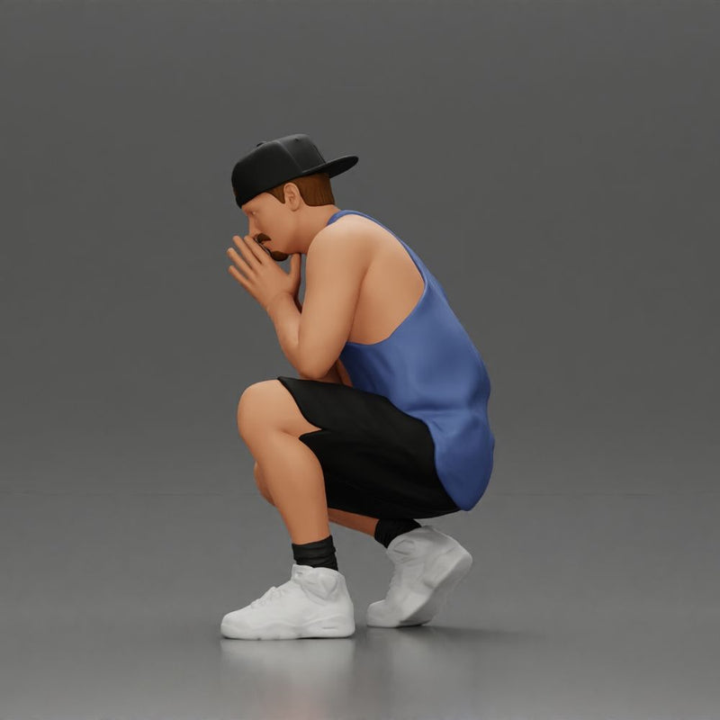 gangster man in shorts and a cap sitting and thinking