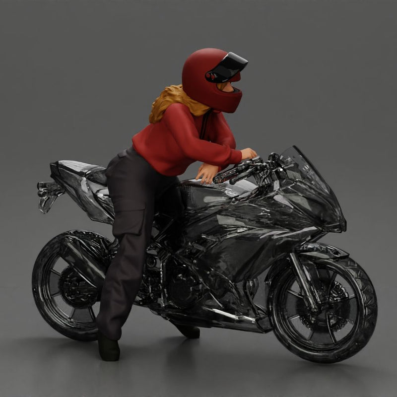 motorcyclist woman in helmet and hoodie sitting on motorcycle