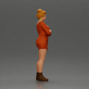 Woman in Orange Dress and Boots Stands Stylishly Confidence With Arms Crossed - Only-Games