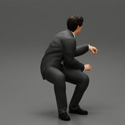 businessman sitting and holding briefcase of money - Only-Games