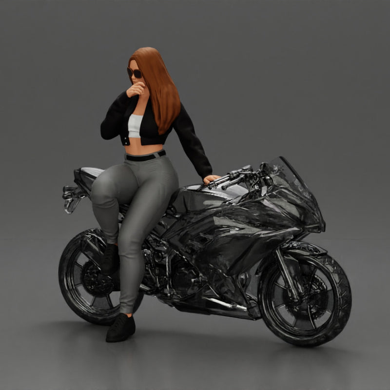 Beautiful girl in sunglasses and  mini jacket sitting on the motorbike