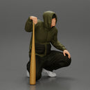 gangster homie in hoodie sitting holding a baseball bat - Only-Games