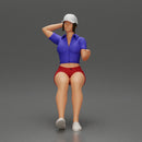 beautiful girl in cap and shorts sitting and drinking - Only-Games