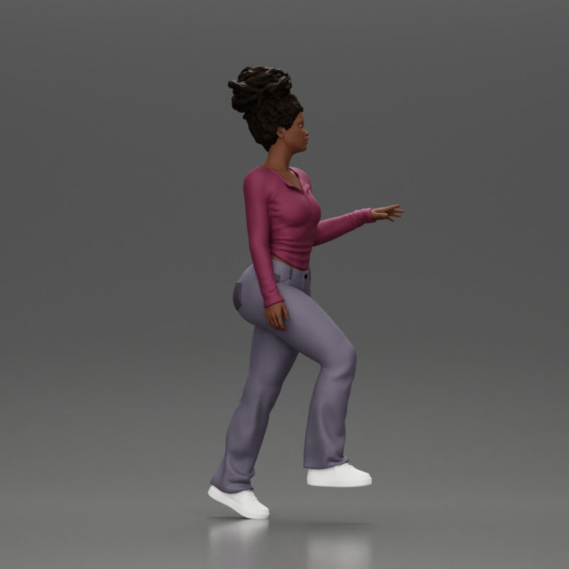 black girl with afro hair walking up stairs