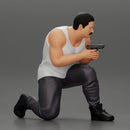 Gangster in pants sitting and holding a gun hides behind the car - Only-Games