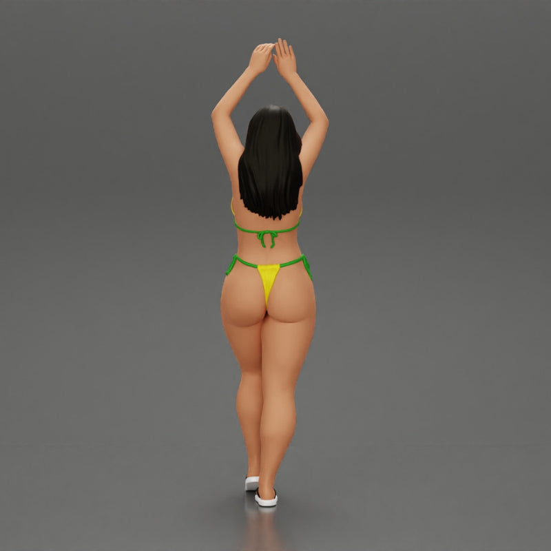 beautiful woman in a bikini with sunglasses standing with her arms raised up on the beach - Only-Games