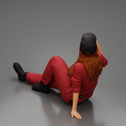 Tired woman mechanic in suit and cap sitting and drinking water during from bottle - Only-Games