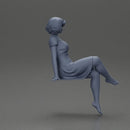 beautiful girl in dress sitting outside with her short hair blowing in the wind - Only-Games