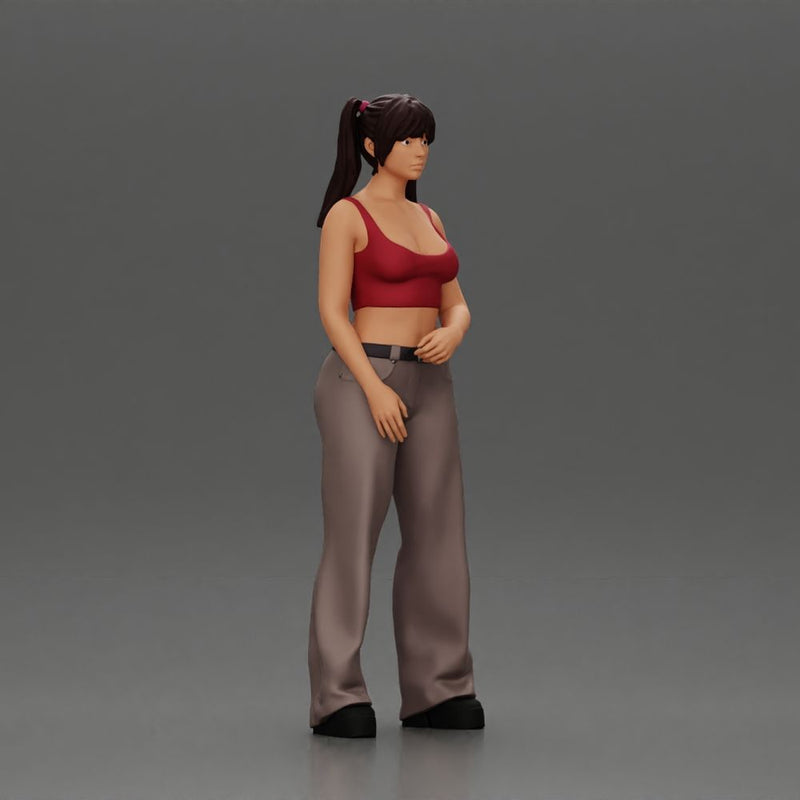 Chola girl with pigtails standing in flared pants