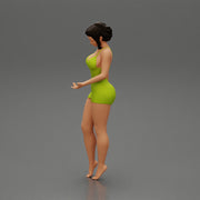 Sexy Girl standing in mini dress on the beach - Only-Games