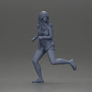 Afraid young woman running in an open shirt and shorts with a determined expression - Only-Games