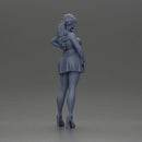 Confident Woman in Blue Dress Posing with Graceful Elegance - Only-Games