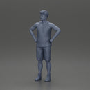 Man standing with his hands on his hips thinking and wondering - Only-Games